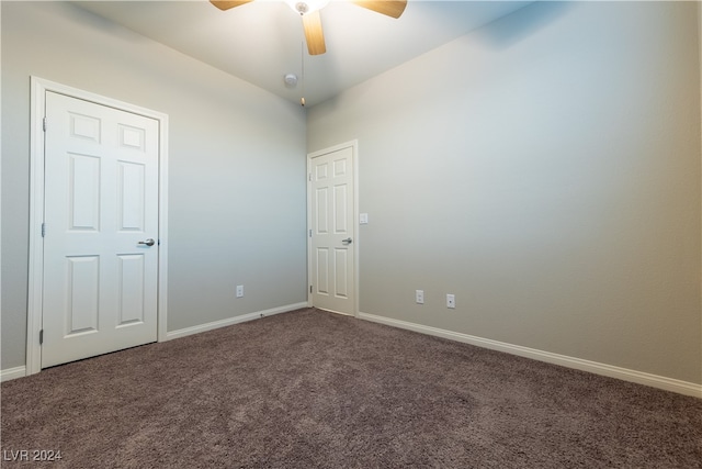 empty room with carpet and ceiling fan