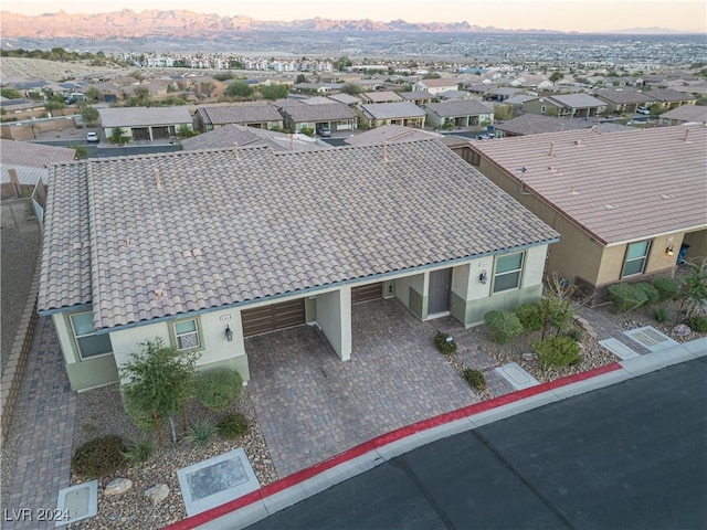 2664 Chinaberry Hill St, Laughlin, NV 89029 - aerial view at dusk of a residential view and a mountain view