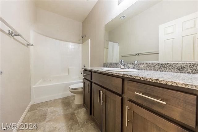 full bathroom with toilet, vanity, and shower / bath combination with curtain