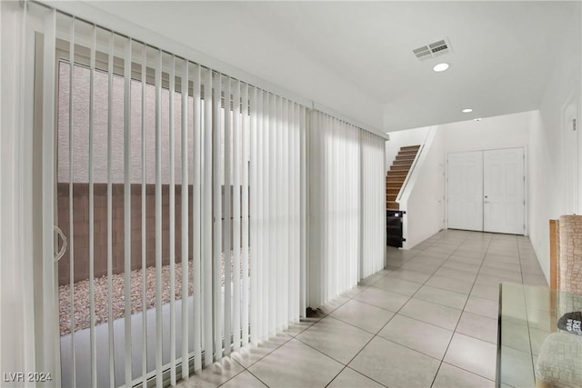 8212 Minots Ledge Ave, Las Vegas, NV 89147 - hallway featuring stairs, tile patterned flooring, and recessed lighting