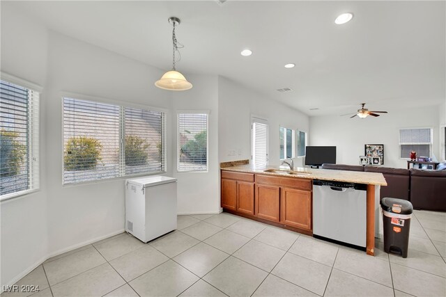 kitchen with ceiling fan, refrigerator, dishwasher, pendant lighting, and sink