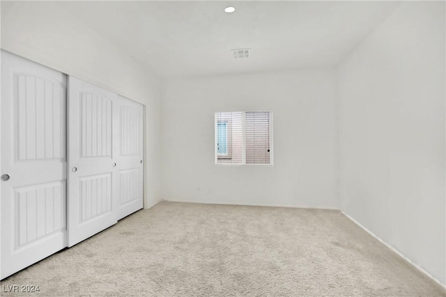 8212 Minots Ledge Ave, Las Vegas, NV 89147 - unfurnished bedroom with carpet floors and a closet