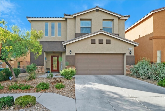 view of front of property featuring a garage