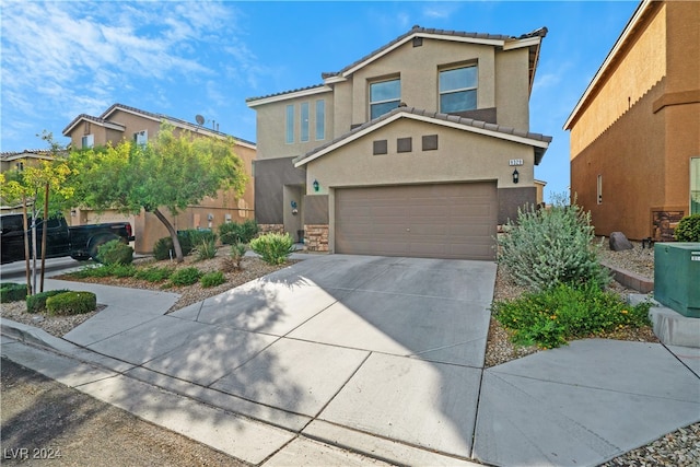 front of property with a garage