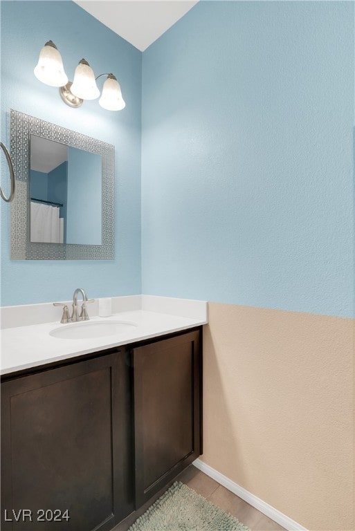 bathroom featuring tile patterned floors and vanity