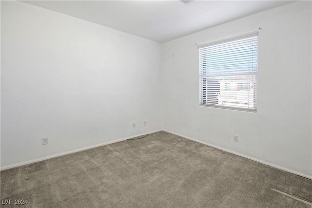 unfurnished room with carpet floors