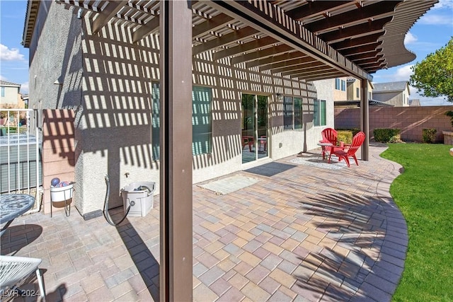 view of patio featuring a pergola