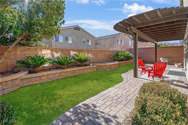 view of yard with a pergola and a patio