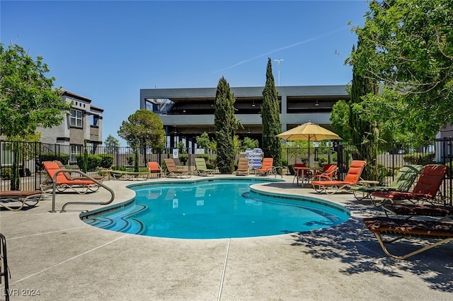 view of pool featuring a patio