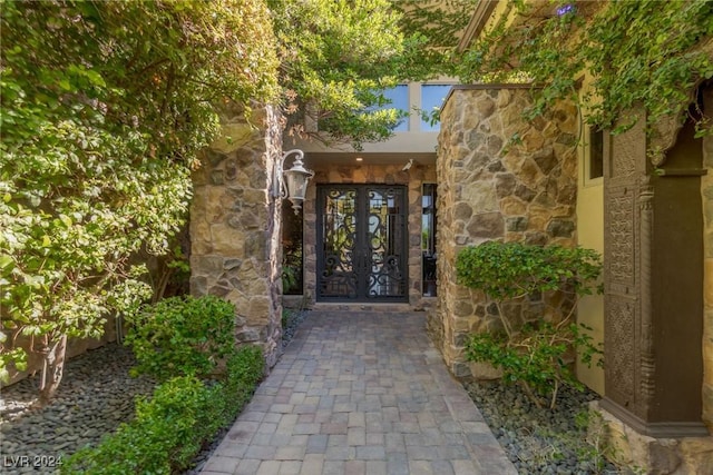 entrance to property featuring french doors