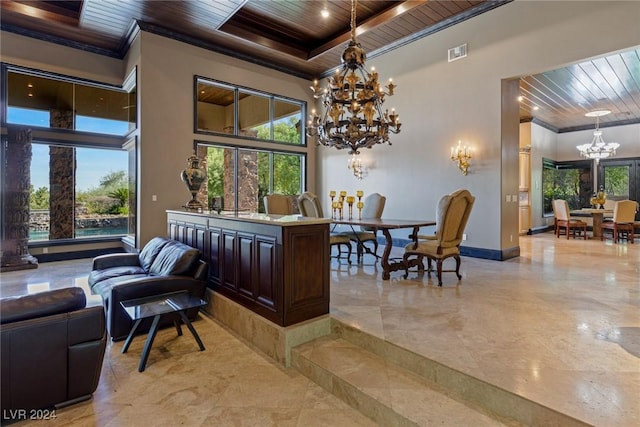 interior space featuring ornamental molding, a towering ceiling, and wooden ceiling