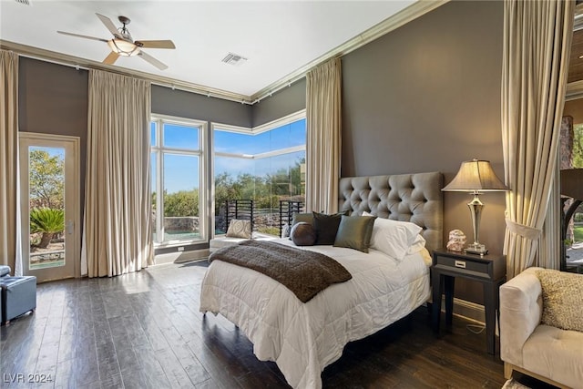 bedroom with dark wood-type flooring, access to outside, ceiling fan, and crown molding