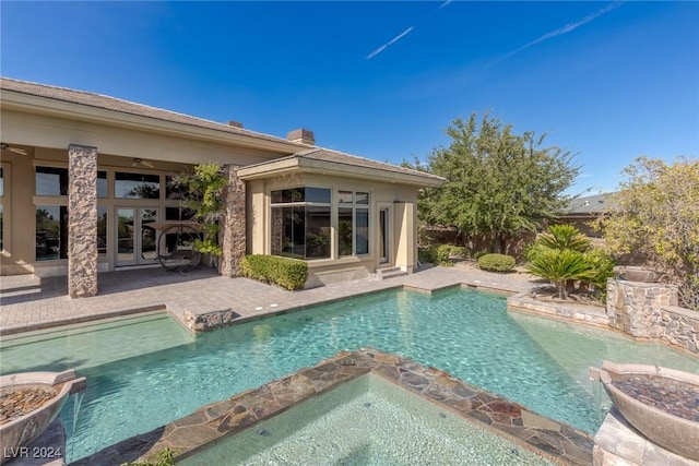 view of swimming pool featuring a patio area