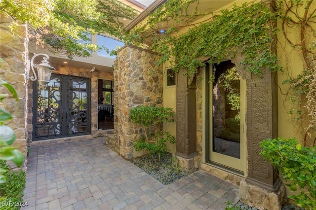 entrance to property featuring french doors