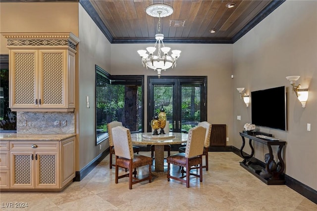 dining area featuring french doors, an inviting chandelier, crown molding, and wood ceiling