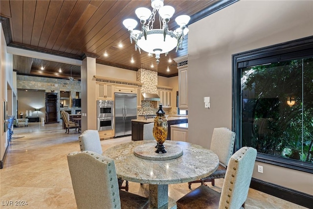 dining area featuring an inviting chandelier, crown molding, and wooden ceiling