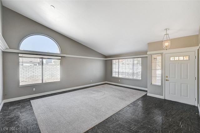 foyer featuring lofted ceiling