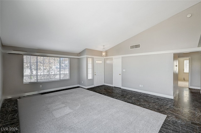 interior space featuring high vaulted ceiling