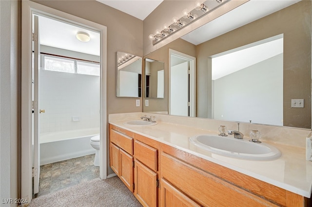 full bathroom featuring vanity, shower / washtub combination, and toilet