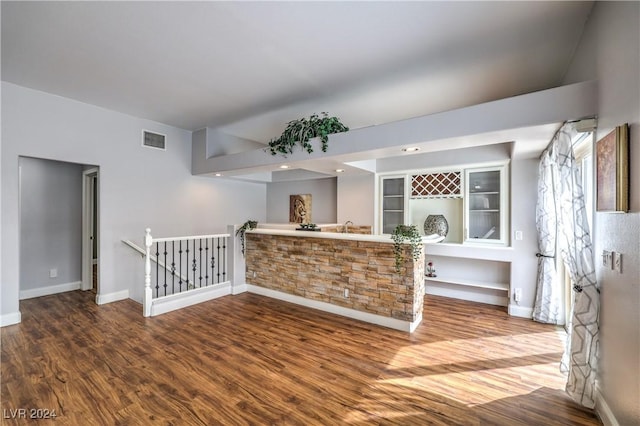 bar featuring hardwood / wood-style floors