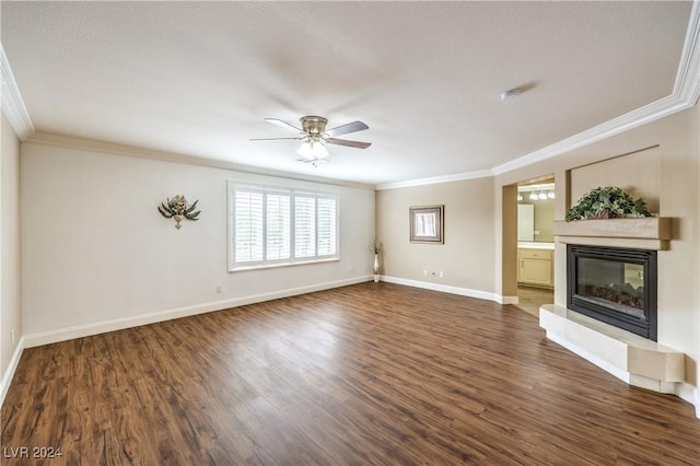 unfurnished living room featuring ceiling fan, dark hardwood / wood-style flooring, and crown molding