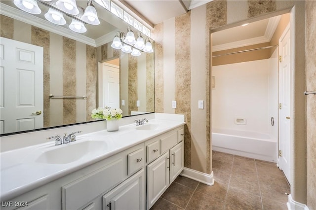 bathroom with tub / shower combination, vanity, tile patterned floors, and crown molding