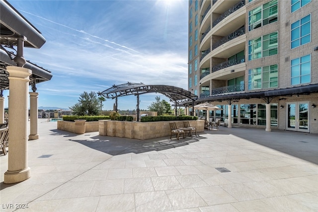 view of home's community featuring a patio area