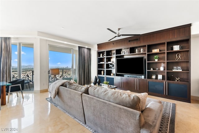 living room featuring ceiling fan