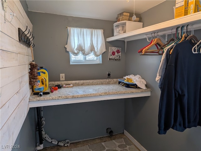 washroom with hookup for an electric dryer