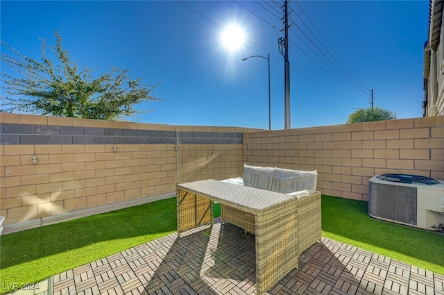 view of patio / terrace featuring cooling unit