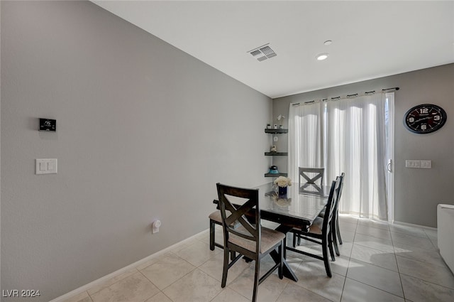 view of tiled dining space