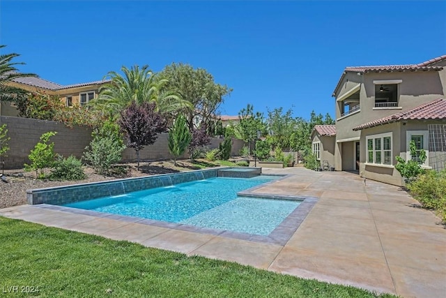 view of swimming pool featuring a patio area and pool water feature