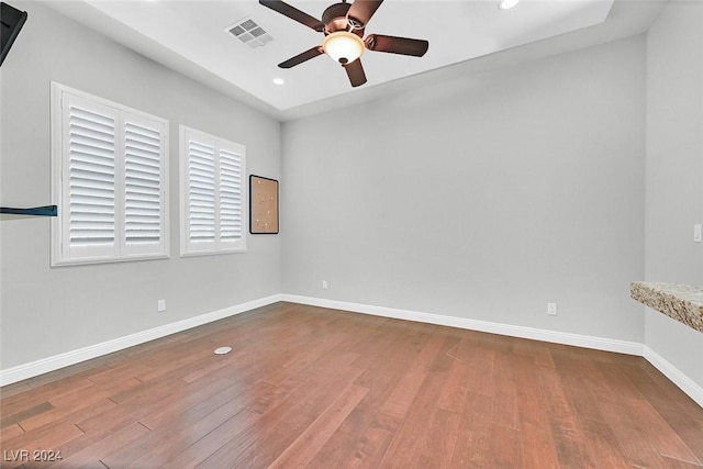 spare room featuring ceiling fan and wood-type flooring