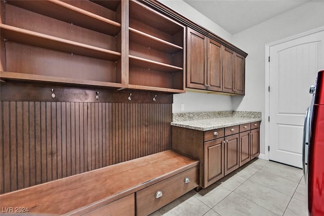 mudroom with light tile patterned floors