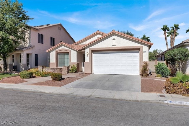 view of front of property featuring a garage