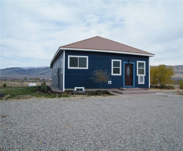 view of front of house with a mountain view