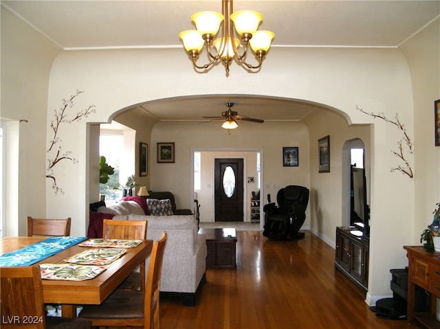 foyer entrance with ceiling fan and dark hardwood / wood-style flooring