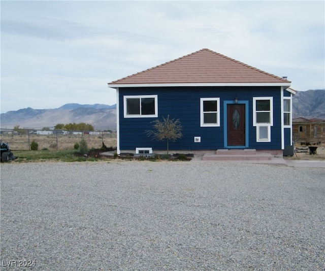 view of front facade featuring a mountain view