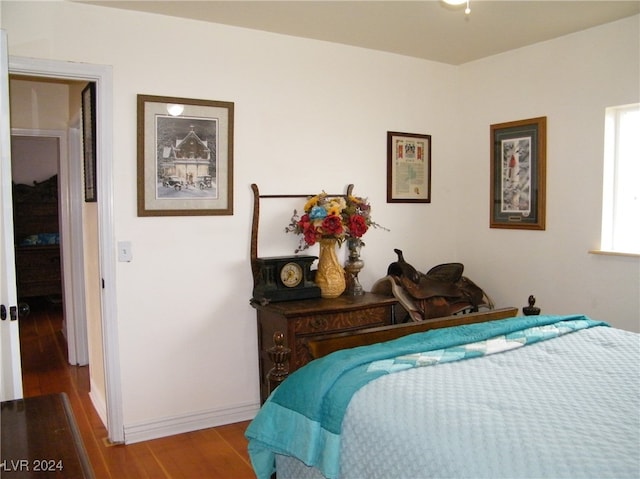 bedroom featuring wood-type flooring