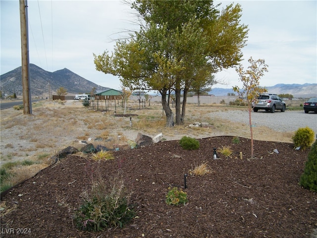 view of yard with a gazebo and a mountain view