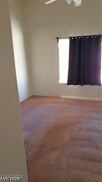 unfurnished room with carpet flooring