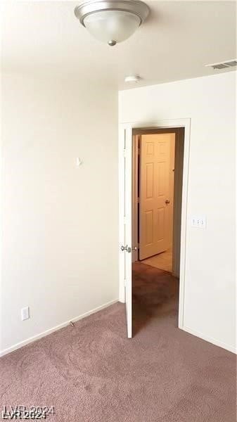 empty room with carpet floors