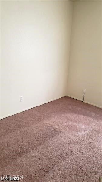 empty room featuring carpet floors