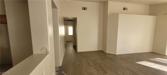 interior space with dark wood-type flooring