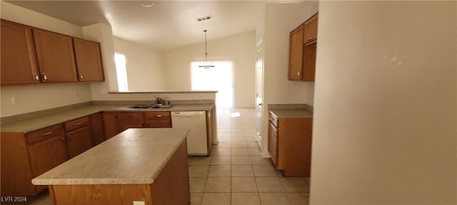 kitchen with sink, light tile patterned floors, hanging light fixtures, white dishwasher, and a kitchen island