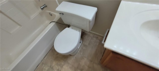 bathroom featuring toilet and a bathing tub