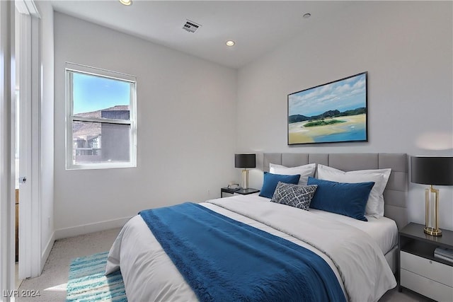 carpeted bedroom featuring visible vents, baseboards, and recessed lighting