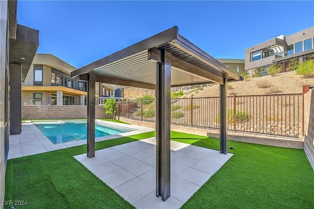 view of pool featuring a lawn, a patio area, a fenced backyard, and a fenced in pool