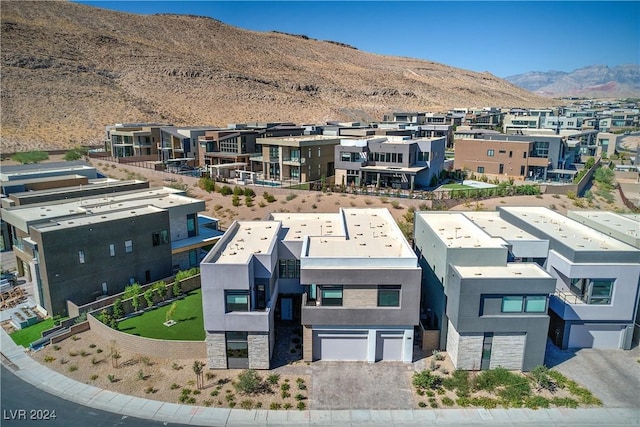 bird's eye view featuring a residential view and a mountain view