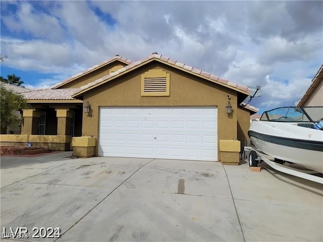 view of front of property featuring a garage